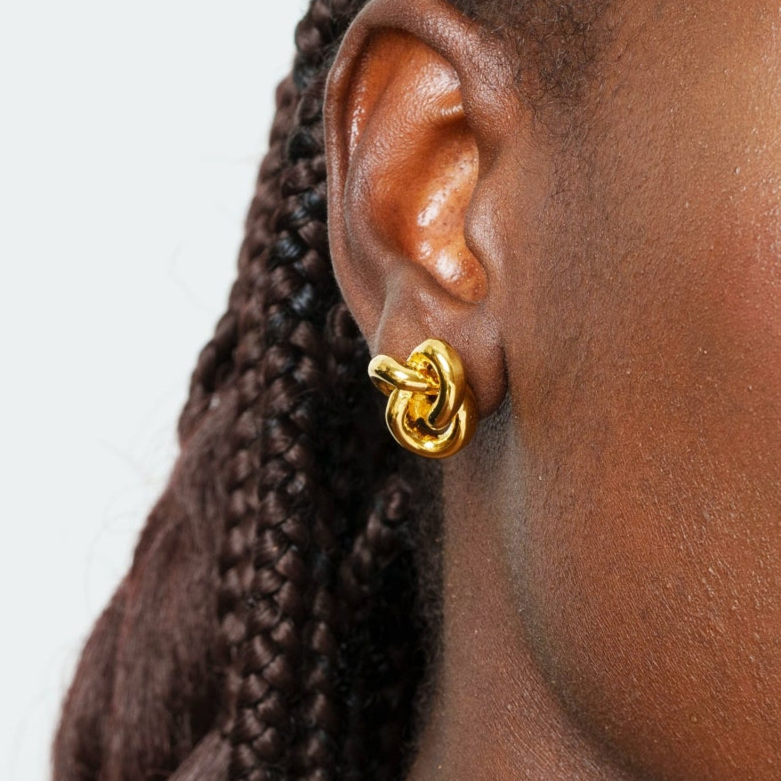 Boucle d'oreille torsadée plaquée or 18 carats
