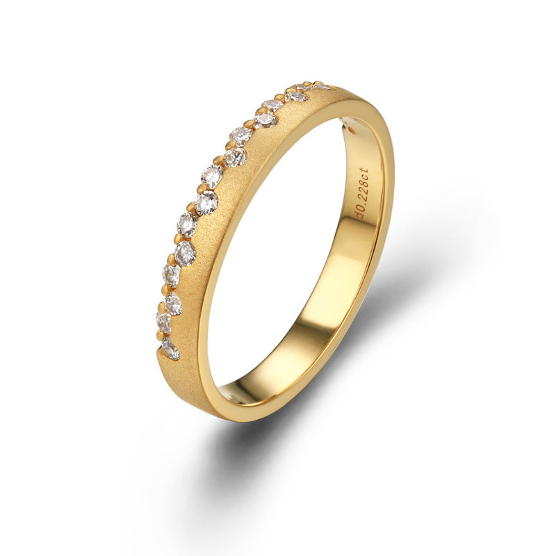 Anillo de oro de 18 quilates con diamantes y estrellas