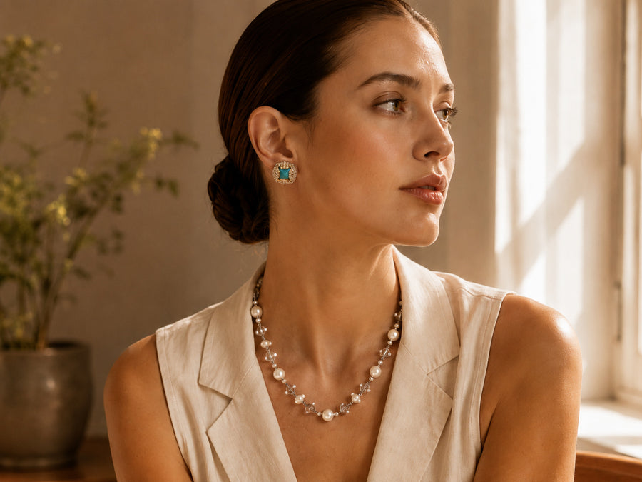 AULUNA jewellery worn in warm natural light